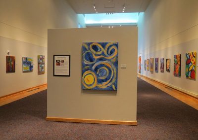 photo of mendoza's artworks in a gallery