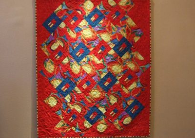 picture of mendoza's painting with a red background and squares and shapes throughout