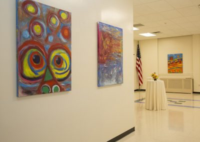 photo of mendoza's artworks in a gallery