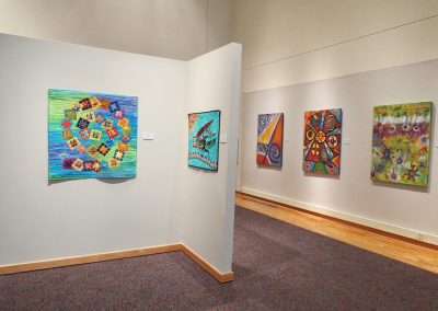 photo of mendoza's artworks in a gallery