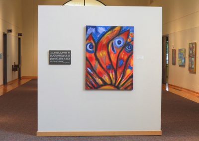 photo of mendoza's artwork in a gallery