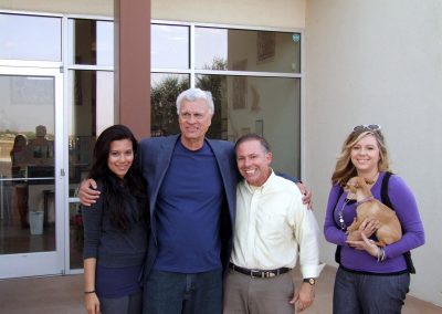 mendoza posed with some people in front of the gallery