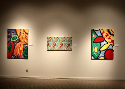 photo of mendoza's artworks in a gallery