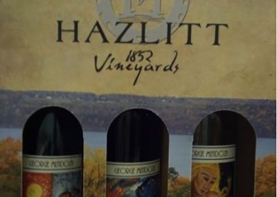 a pack of three wines with mendoza's artwork on the bottles