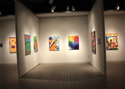 photo of mendoza's artworks in a gallery