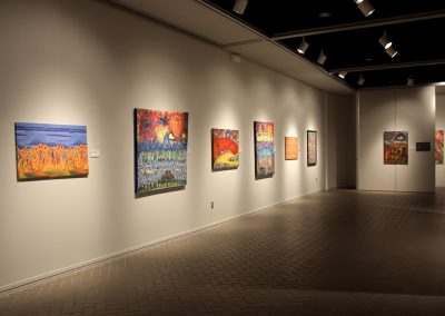 photo of mendoza's artworks in a gallery