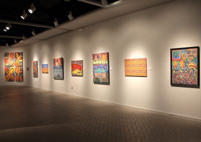 photo of mendoza's artworks in a gallery