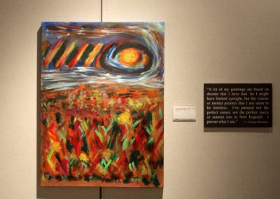 photo of mendoza's artwork of an abstract landscape and a orb in the top right