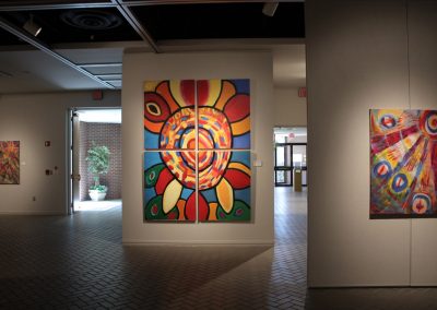 photo of mendoza's artworks in a gallery