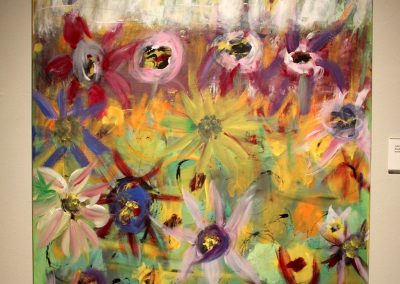 photo of mendoza's artwork of an abstract, colorful painting of flowers