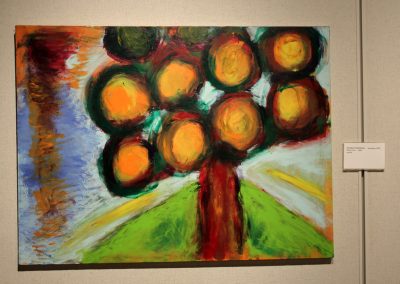 photo of mendoza's artwork of an abstract, colorful painting of a tree
