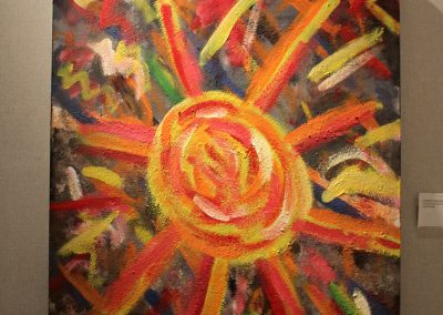 photo of mendoza's artwork of an abstract, colorful painting of the sun